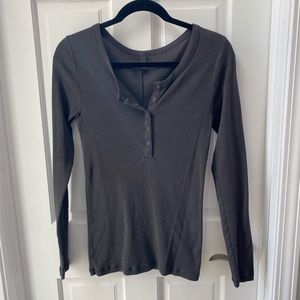 Grey long sleeve partial button down.